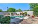 Enjoy the refreshing pool and spa in this backyard with mature landscaping and a peaceful ambiance at 8760 N 73Rd Way, Scottsdale, AZ 85258