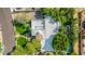 Bird's eye view of home showing a tile roof, mature trees, and grassy yard at 9310 S Bala Dr, Tempe, AZ 85284