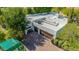 Stunning aerial view of home with a two-car garage and a brick paver driveway at 9310 S Bala Dr, Tempe, AZ 85284