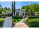 An inviting home featuring professional landscaping, stone walkway, and a charming front exterior at 9310 S Bala Dr, Tempe, AZ 85284