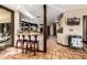 Spacious open kitchen featuring an island with seating and tiled flooring at 9310 S Bala Dr, Tempe, AZ 85284