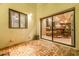 Outdoor patio featuring a sliding glass door that provides seamless indoor/outdoor living with kitchen access at 9310 S Bala Dr, Tempe, AZ 85284