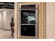 Stainless steel oven and custom cabinetry in this spacious home kitchen at 9310 S Bala Dr, Tempe, AZ 85284