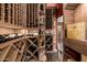 This home boasts a well-stocked and beautifully designed wine cellar with custom shelving at 9310 S Bala Dr, Tempe, AZ 85284