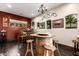 Gather around the barrel table in this wine room that also features a wet bar at 9310 S Bala Dr, Tempe, AZ 85284