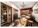 This wine room boasts a barrel table, wet bar, and enclosed wine cellar at 9310 S Bala Dr, Tempe, AZ 85284