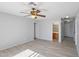 Bedroom featuring new tile, a ceiling fan, and neutral paint at 9420 S 35Th Gln, Laveen, AZ 85339