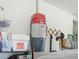 Image showing a central vacuum system installed in garage and storage shelving at 10010 W Illini St, Tolleson, AZ 85353