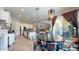 The dining area is adjacent to the kitchen and features sliding glass doors to the outdoor patio at 10440 W Swayback Pass, Peoria, AZ 85383