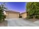 Stunning single-Gathering home with a three-car garage and low maintenance landscaping at 10440 W Swayback Pass, Peoria, AZ 85383