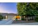 Inviting single-Gathering home exterior with a well-maintained yard and lovely curb appeal at 10440 W Swayback Pass, Peoria, AZ 85383