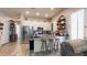 Modern kitchen featuring stainless steel appliances and an island with bar seating at 10440 W Swayback Pass, Peoria, AZ 85383