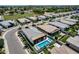 Aerial view showcasing the property with a swimming pool and surrounding neighborhood at 1202 E Nolan Pl, Chandler, AZ 85249