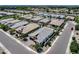 An aerial view showing the homes in the neighborhood with nearby roads at 1202 E Nolan Pl, Chandler, AZ 85249