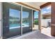 Sliding glass doors open to a patio with views of the pool and backyard at 1202 E Nolan Pl, Chandler, AZ 85249
