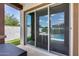 Patio area with sliding glass doors that overlook backyard pool at 1202 E Nolan Pl, Chandler, AZ 85249