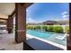 Backyard pool area with ample patio space and lounge furniture at 1202 E Nolan Pl, Chandler, AZ 85249