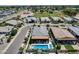 Aerial view of the backyard featuring a modern pool, lounge chairs, and well-maintained landscaping at 1202 E Nolan Pl, Chandler, AZ 85249
