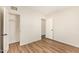 Bedroom with closet and wood-look flooring, ready for personalization at 122 N 5Th St, Avondale, AZ 85323