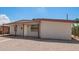 Well-kept single-story house with a gravel yard, offering a simple and clean aesthetic at 122 N 5Th St, Avondale, AZ 85323