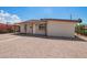 Single-story home with desert landscaping, showcasing a simple, clean design at 122 N 5Th St, Avondale, AZ 85323