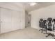Neutral bedroom with carpet, ceiling fan, closet, and space for a desk and chair at 1350 S Greenfield Rd # 1123, Mesa, AZ 85206