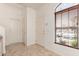 Bright entryway with neutral tile flooring, leading to other rooms at 1350 S Greenfield Rd # 1123, Mesa, AZ 85206
