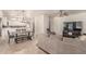 Open-concept living space featuring a dining area, kitchen, and comfortable furnishings at 1350 S Greenfield Rd # 1123, Mesa, AZ 85206