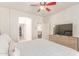 Bedroom featuring ceiling fan and a dresser with TV at 1350 S Greenfield Rd # 1123, Mesa, AZ 85206