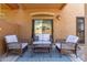 Relaxing covered patio with comfortable seating and outdoor decor at 1350 S Greenfield Rd # 1123, Mesa, AZ 85206