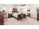 Spacious bedroom featuring a dark wood bed frame, neutral walls, and plush carpeting at 1528 N Balboa --, Mesa, AZ 85205