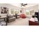 Bedroom featuring ample natural light, plush carpeting, and comfortable seating areas at 1528 N Balboa --, Mesa, AZ 85205