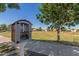 Charming community library surrounded by a grassy park with a walking path in a residential neighborhood at 1528 N Balboa --, Mesa, AZ 85205