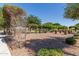Scenic community park showcasing trellised benches, manicured grounds, and a serene environment at 1528 N Balboa --, Mesa, AZ 85205