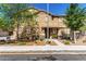 Charming two-story home with inviting curb appeal, landscaping, and decorative stone accents at 1528 N Balboa --, Mesa, AZ 85205