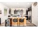Bright kitchen with granite countertops, stainless steel appliances, and center island with seating at 1528 N Balboa --, Mesa, AZ 85205