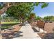 Picturesque community park with benches, green lawns, and paved paths ideal for recreation and relaxation at 1528 N Balboa --, Mesa, AZ 85205