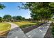 Inviting community park showcases manicured lawns, shaded walkways, and picturesque seating areas for relaxation at 1528 N Balboa --, Mesa, AZ 85205