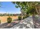 Charming community playground features a variety of play structures, a shaded picnic area, and mature landscaping at 1528 N Balboa --, Mesa, AZ 85205