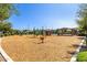 Community playground with colorful equipment, soft landing surface, and shaded picnic area, perfect for Gathering fun at 1528 N Balboa --, Mesa, AZ 85205