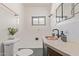 Bathroom with a copper sink, and white tiled walls and shower at 1545 E Christy Dr, Phoenix, AZ 85020