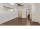 Spacious bedroom features a neutral color palette and natural light from a horizontal window at 1545 E Christy Dr, Phoenix, AZ 85020
