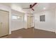 Bright, well-lit bedroom with a ceiling fan, offering comfort and style at 1545 E Christy Dr, Phoenix, AZ 85020