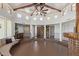 Open floor plan featuring beams, brick fireplace, and railing at 1545 E Christy Dr, Phoenix, AZ 85020