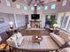 Bright and airy living room boasts a fireplace, high ceilings, and an open layout perfect for entertaining guests at 1545 E Christy Dr, Phoenix, AZ 85020