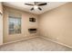 Neutral bedroom with a ceiling fan, carpet and lots of natural light at 1612 W Lacewood Pl, Phoenix, AZ 85045