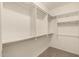 Walk in closet with built in shelving and closet rods at 1612 W Lacewood Pl, Phoenix, AZ 85045