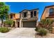 Inviting two-story home with well-maintained landscaping and a two-car garage at 1612 W Lacewood Pl, Phoenix, AZ 85045