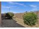 Picture of the backyard area featuring desert landscaping and block wall at 16525 W Tranquility Ln, Surprise, AZ 85387