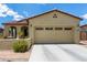 Charming home featuring desert landscaping, covered porch, and a two-car garage at 16756 S 181St Ln, Goodyear, AZ 85338